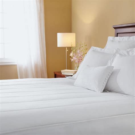 Heated mattress pads also keep the warmth around your entire body better than a blanket does because the blanket allows a lot of the heat to travel to the ceiling. Sunbeam Queen Heated Mattress Pad-MSU1GQSN00011 - The Home ...