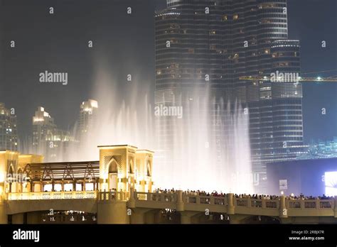 Uae Dubai The Pedestrian Bridge Dubai Fountain And Burj Khalifa