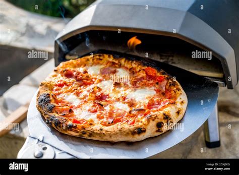 Making Homemade Pizza In Portable High Temperature Gas Pizza Oven