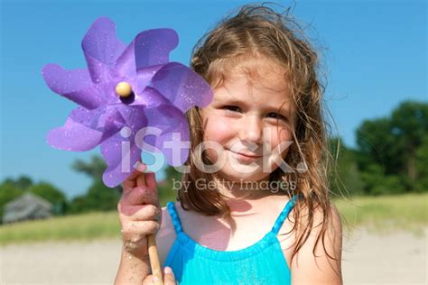 Little Girl Holding Pinwheel Stock Photo Royalty Free Freeimages