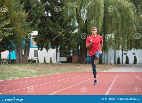 Young Male Athlete Running On Track Stock Image Image Of