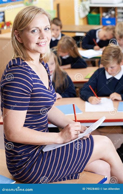 Portrait Of Teacher In Class With Pupils Stock Image Image Of Looking Camera 79028483