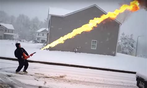 Clearing Snow With A Flame Thrower