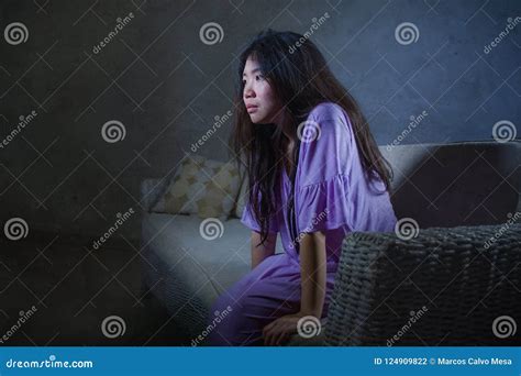 Young Sad And Depressed Asian Chinese Woman Crying Alone Desperate