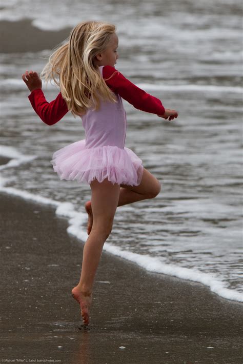 All Sizes Cute Little Girl In Pink Dances On Beach During The Kite