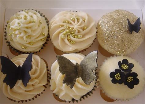 Make your party stand out from the rest. Black & Gold Wedding Cupcakes | Flickr - Photo Sharing!