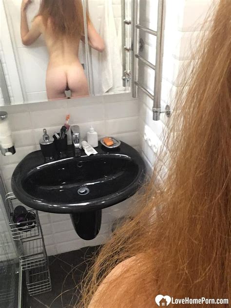 Exquisitely Images Of Messy Redhead Takes Nudes In A Public Shower