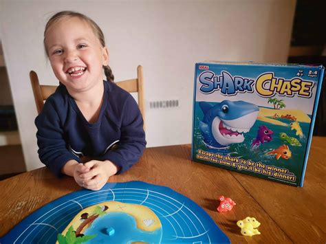 Capture and regenerate as you carom around the wraparound board. Shark Chase Board Game Review - Me, him, the dog and a baby!