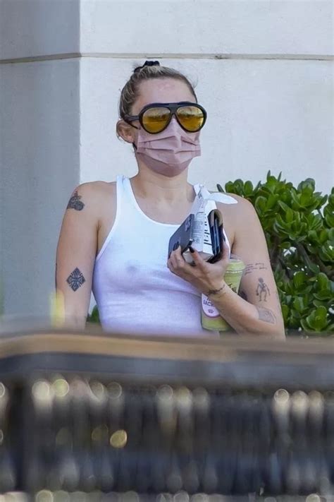 Miley Cyrus Turns Heads As She Steps Out In Completely See Through Tank Top Irish Mirror Online
