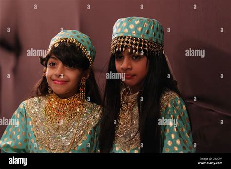 Dubai United Arab Emirates Girls In Festive Robes In Portrait Stock