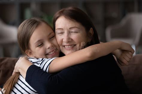 Loving Elderly Mom And Adult Daughter Hugging Stock Image Image Of