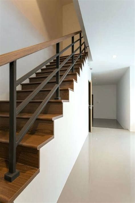 Modernism is a style that first came into being in defiance of the tradition that accompanied the styles before. modern wood railings for stairs beautiful stair railing ...