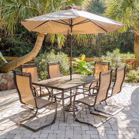 Whether you're looking for just a patio table, outdoor chairs or a complete patio. Hanover Outdoor Monaco 7-Piece Tile-Top Dining Set with ...