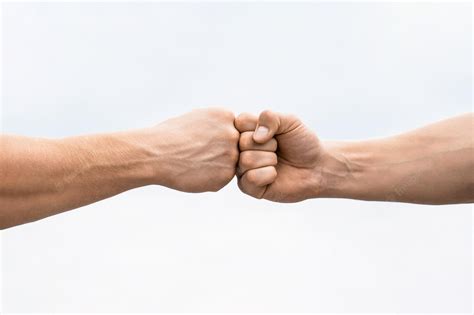 Premium Photo Teamwork And Friendship Partnership Concept Man Giving Fist Bump Bumping Fists