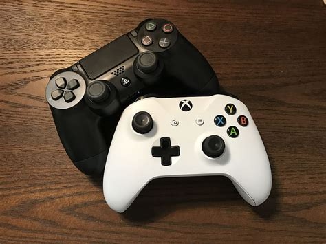 Hd Wallpaper White Xbox And Sony Ps4 Controllers On Brown Surface