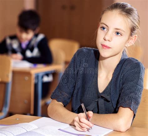 School Girls Sitting At Their Desk Stock Photo Image Of Caucasian