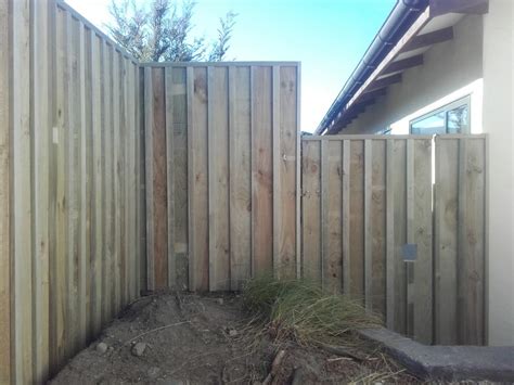 One rather narrow right of way in outside christchurch new zeeland (2004). Batten timber fence with gate - Urban fencing Wanaka