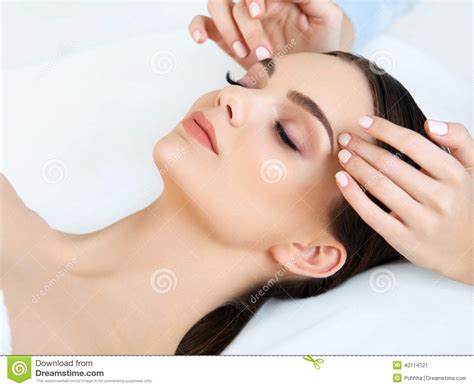 Face Massage Close Up Of A Young Woman Getting Spa Treatment Stock Image Image Of Female