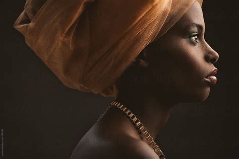 African Woman With An Orange Turban By Stocksy Contributor Lumina African Women Beauty