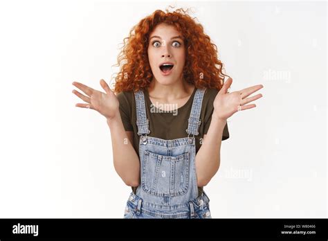 Amused Curly Haired Ginger Girl Explain Wonderful News Shaking Hands