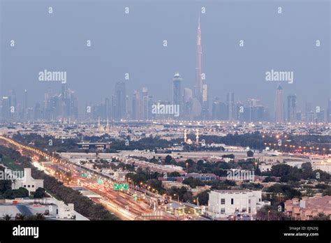 Skyline Of Dubai Illuminated At Night United Arab Emirates Stock Photo