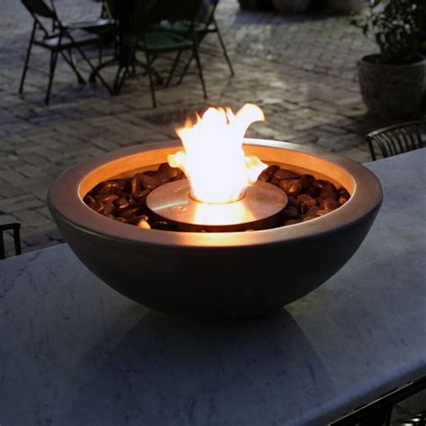 An ethanol fireplace in casing with front fire view provides elegance and warmth to spaces of all kinds. Mix 600 Ethanol Fire Pit | Milkcan Outdoor Products