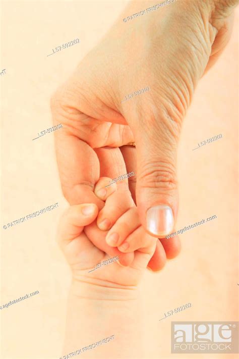 Baby Hand Holding Parents Hand Stock Photo Picture And Rights Managed