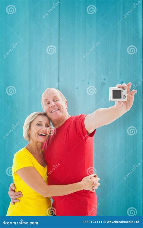 Composite Image Of Happy Mature Couple Taking A Selfie Together Stock Image Image Of Couple