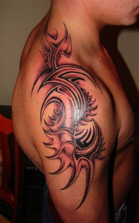 Angel with open wings is amazing. 25 Tribal Shoulder Tattoos Which Are Awesome | CreativeFan