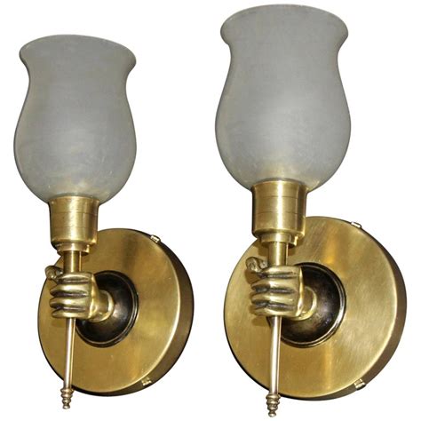 Pair Of John Devoluy Style Hand Torch Bronze Wall Sconces At 1stdibs
