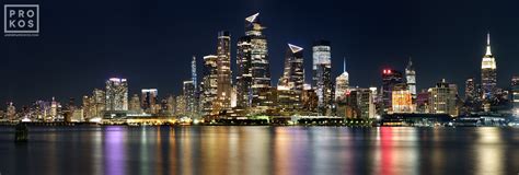 Panoramic Skyline Of New York City From Hoboken At Night Framed Photo