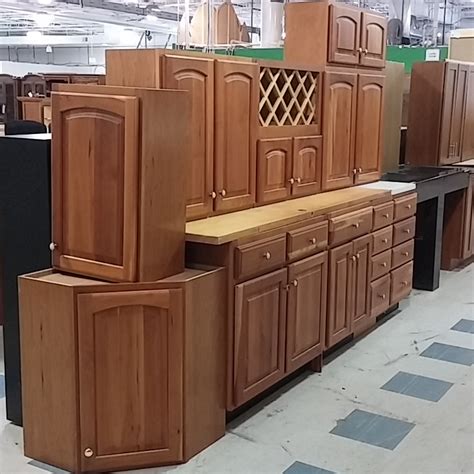 We'll give you a basic. Cabinets with Wine Rack - Morris Habitat for Humanity ReStore