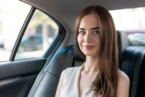 Free Photo Business Woman Posing Inside A Car