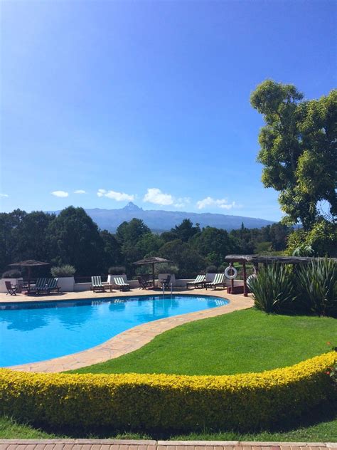 Blue Skies And Inviting Blue Pool With Majestic Mt Kenya For A Back
