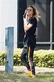 Cara Delevingne keeps a low profile in a black fedora as she touches ...