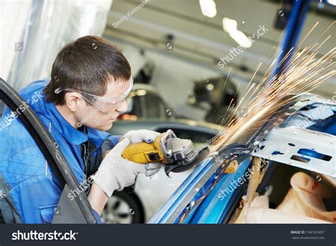 Professional Repairman Worker Automotive Industry Grinding Stock Photo
