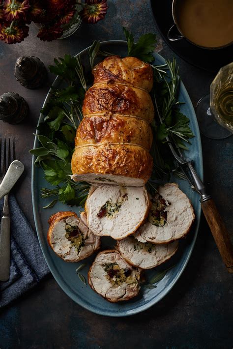 roasted turkey breast roulade with cranberry herb stuffing olive and mango