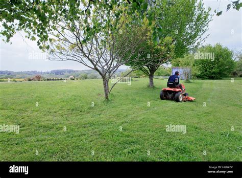 On A Ride On Mower Hi Res Stock Photography And Images Alamy