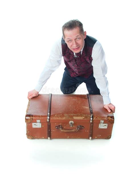 A Man Sits On A Suitcase Stock Photo Image Of White 18765062