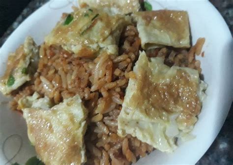 And can anyone provide tips on how on earth one eats rice with chopsticks with elegance and decorum? How To Cook Jollof Rice With Egg Or Boiled Egg / West ...