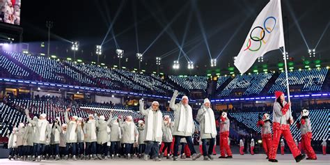 Russian Olympic Team Walks Out In Neutral Colors At Opening Ceremony