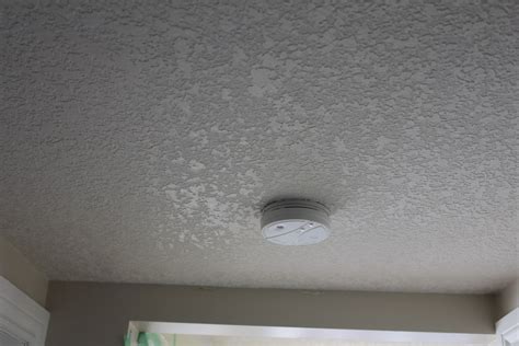 It hides ceiling imperfections with ease and covers stained. Popcorn texture removal, Knockdown application, step 6 ...