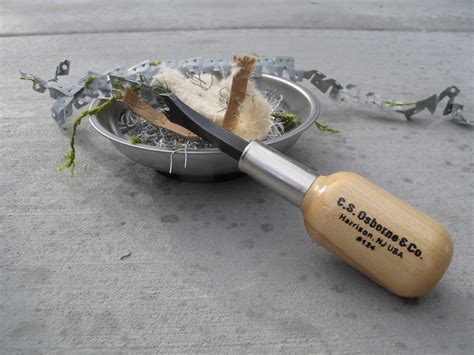 The two prongs on the end of the tool will easily grip the staple, then the bent handle gives you leverage to remove it. Little Miss Penny Wenny: Best tools for upholstery staple ...