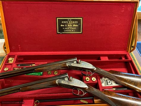 A Pair Of Best London 12 Bore John Wilkes Side By Side Shotguns For Sale