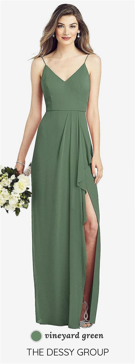 A Woman In A Green Bridesmaid Dress Holding A Bouquet