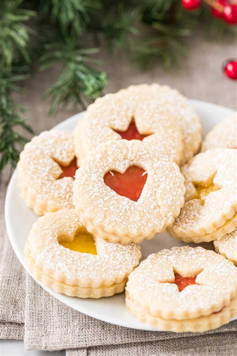 These authentic austrian linzer cookies will be your favorite christmas cookies ever! Austrian Cookie Recipes - Chocolate Dipped Biscuits ...