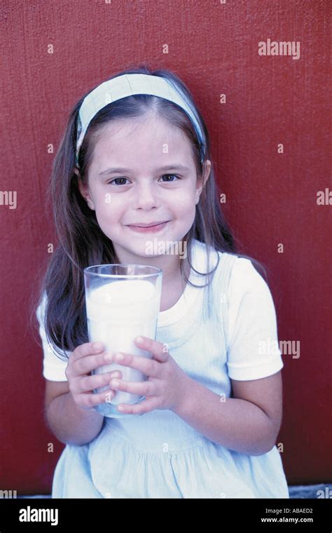 Girl Drinking Milk Stock Photo Alamy