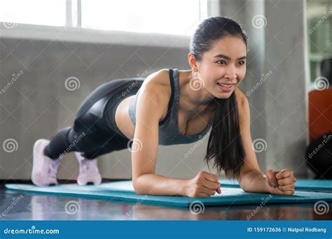Beautiful Asian Fitness Young Woman In Sportswear Doing Plank In Gym Sport Fit Girl Push Up