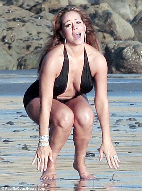 Mariah Carey Shows Off Her Figure In A Cut Out Swimsuit Daily Mail Online