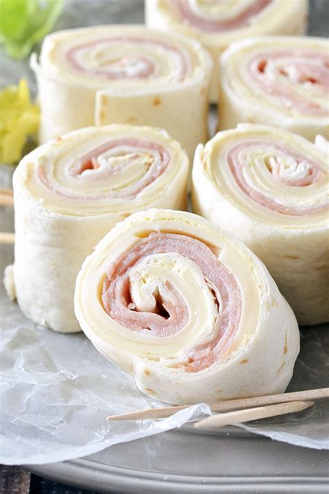 an easy and delicious recipe for ham and cheese pinwheels these tasty pinwheels make the